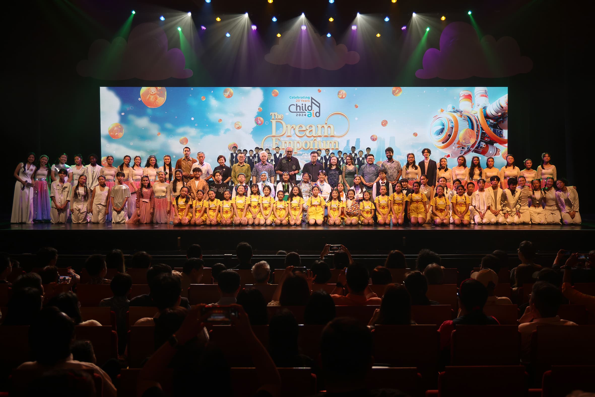 ChildAid 2024 — performers and guests on stage for the anniversary finale, The Dream Emporium