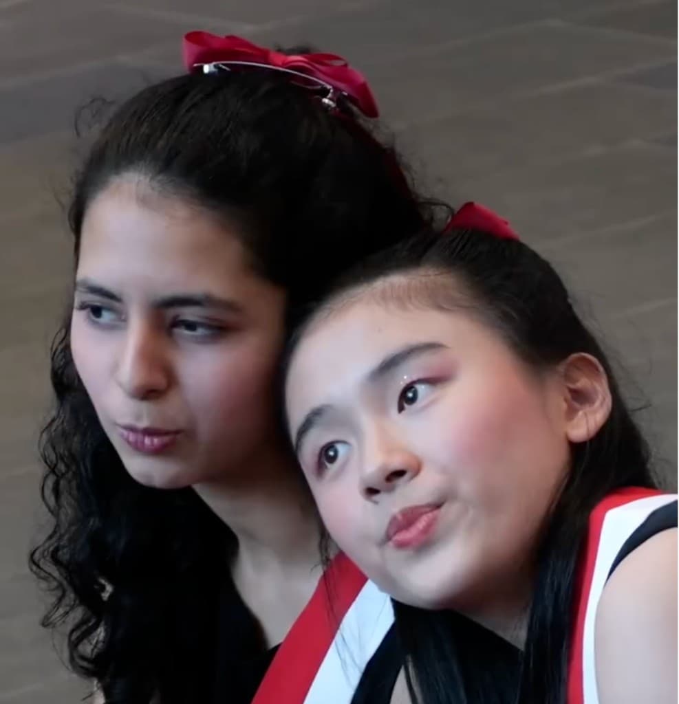Tara backstage with a fellow choir performer